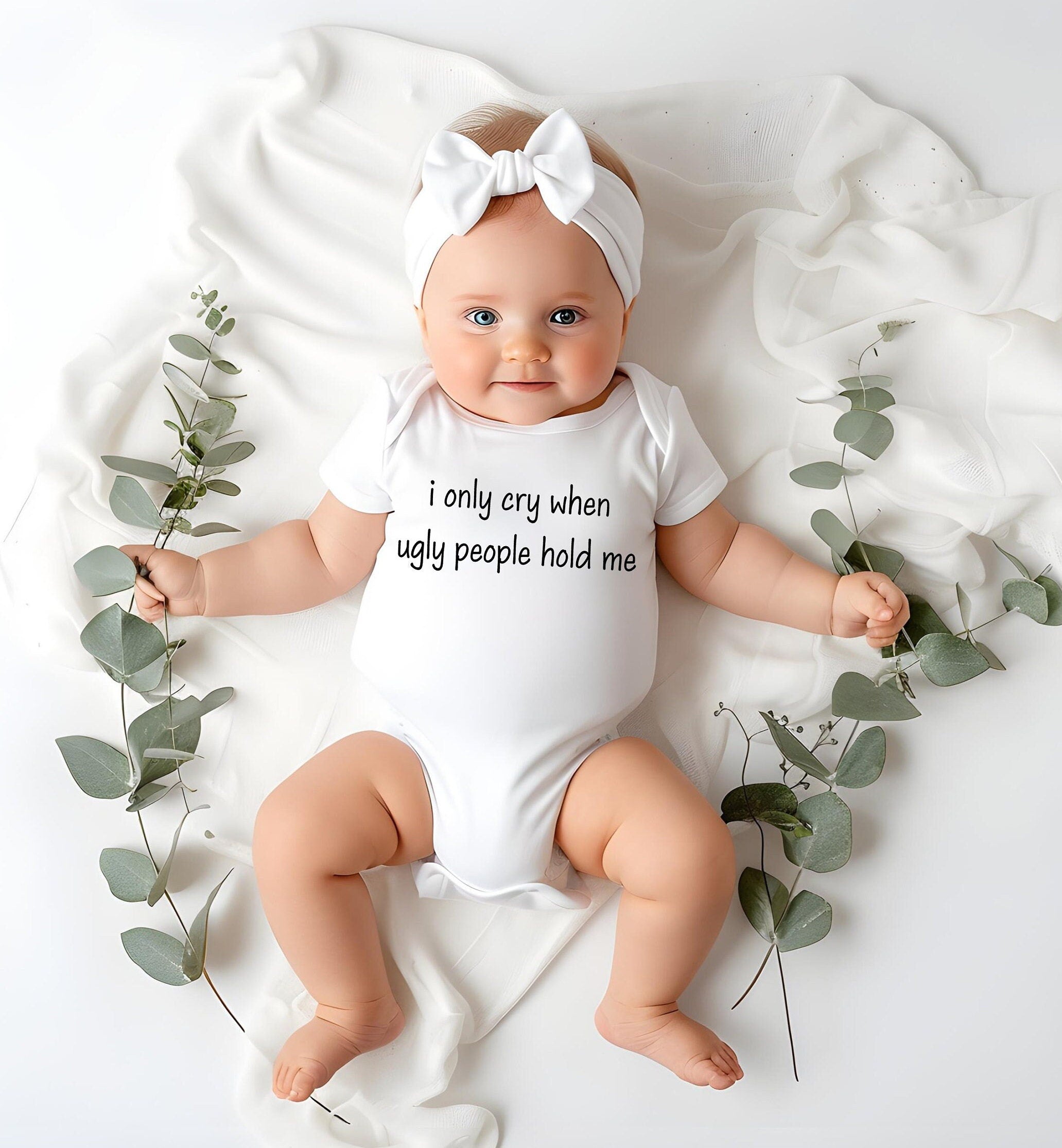I Only Cry When Ugly People Hold me Baby Bodysuit