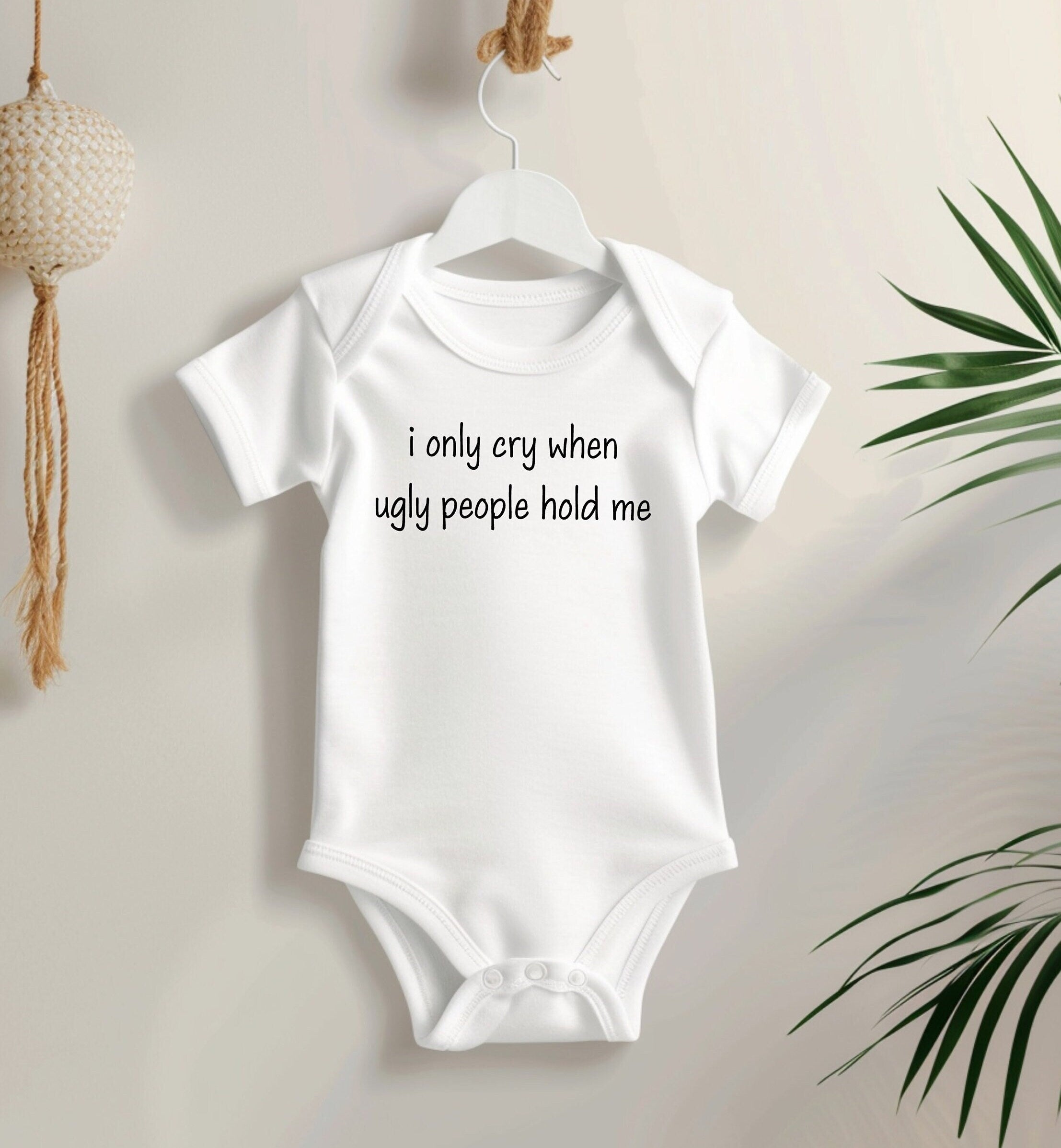 I Only Cry When Ugly People Hold me Baby Bodysuit