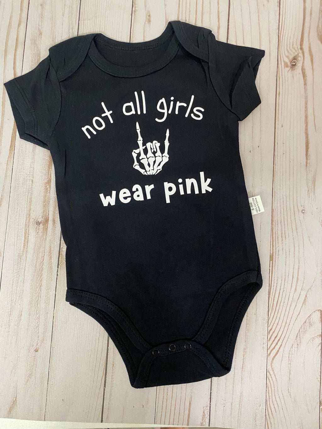 Not All Girls Wear Pink Rock On  Baby Bodysuit