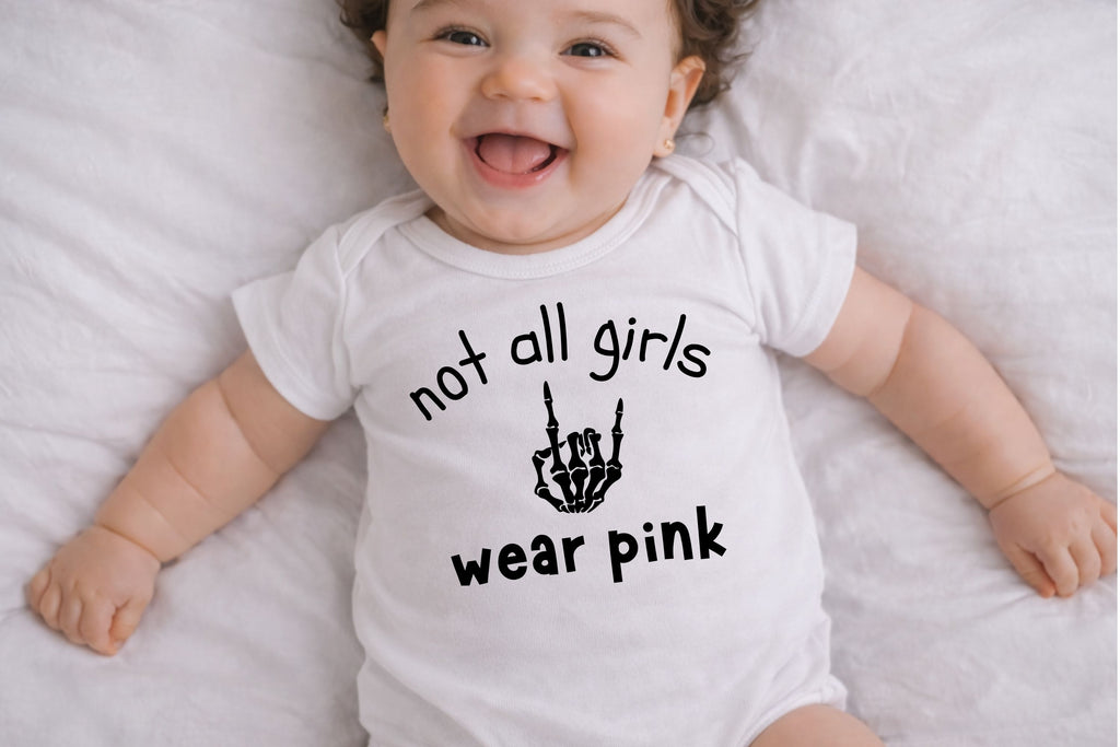 Not All Girls Wear Pink Baby Bodysuit
