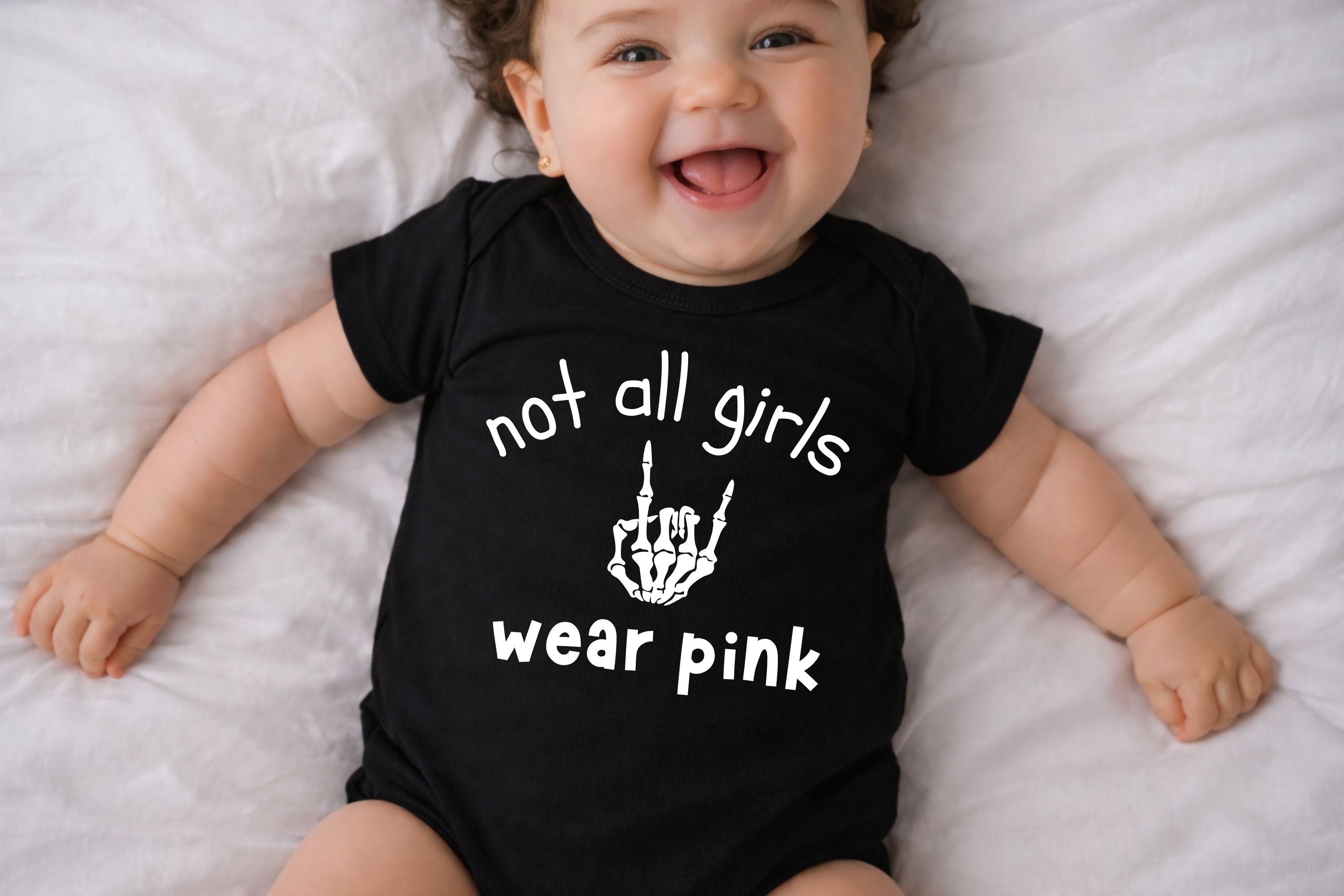 Not All Girls Wear Pink Baby Bodysuit
